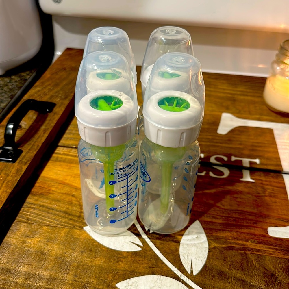 4-4oz Dr Browns bottles WITHOUT NIPPLES.In great condition, washed/Sterilized